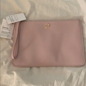 NWT lululemon goody bag (wristlet) in pink